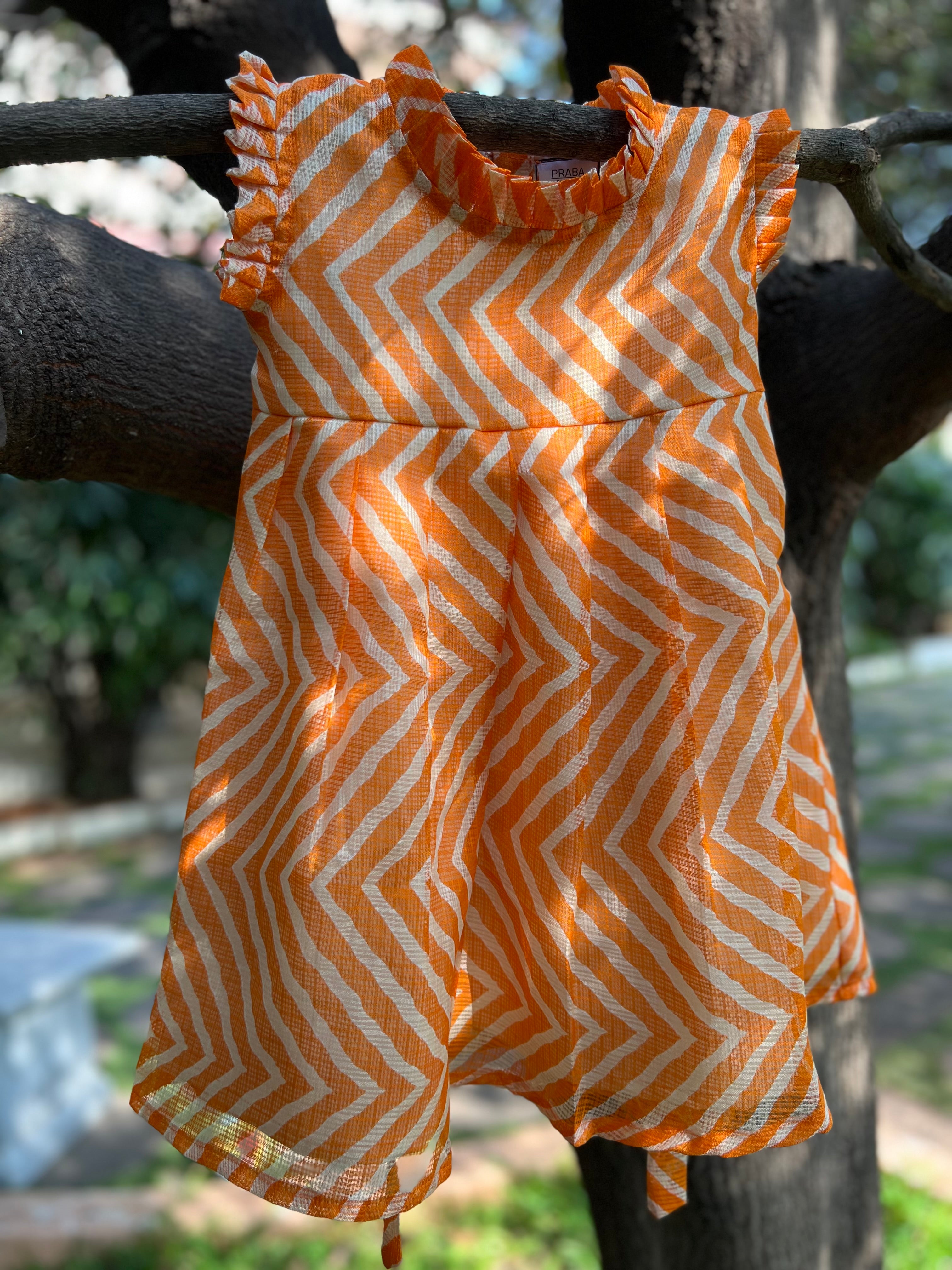 Orange frock frill on neck and sleeve