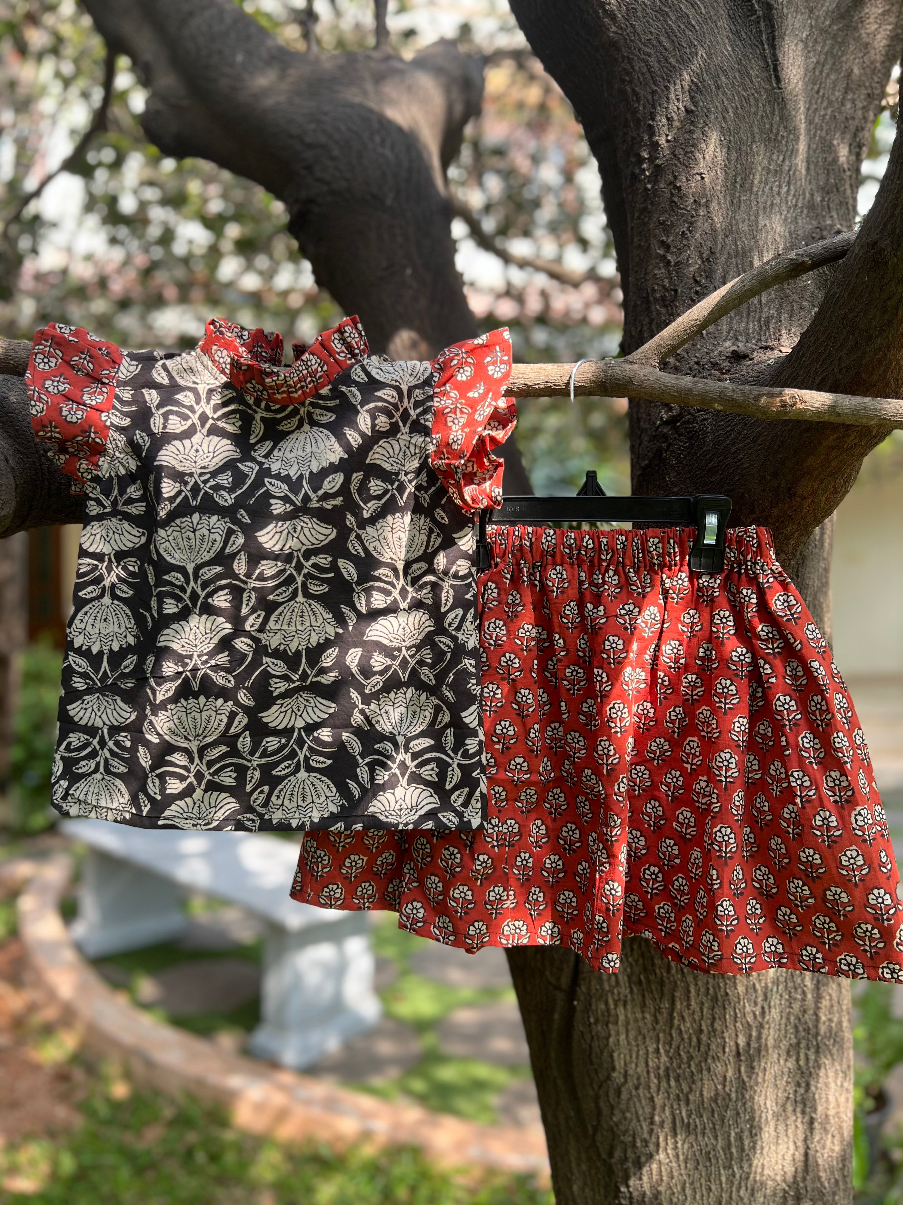 Black Floral Top & Red Skirt
