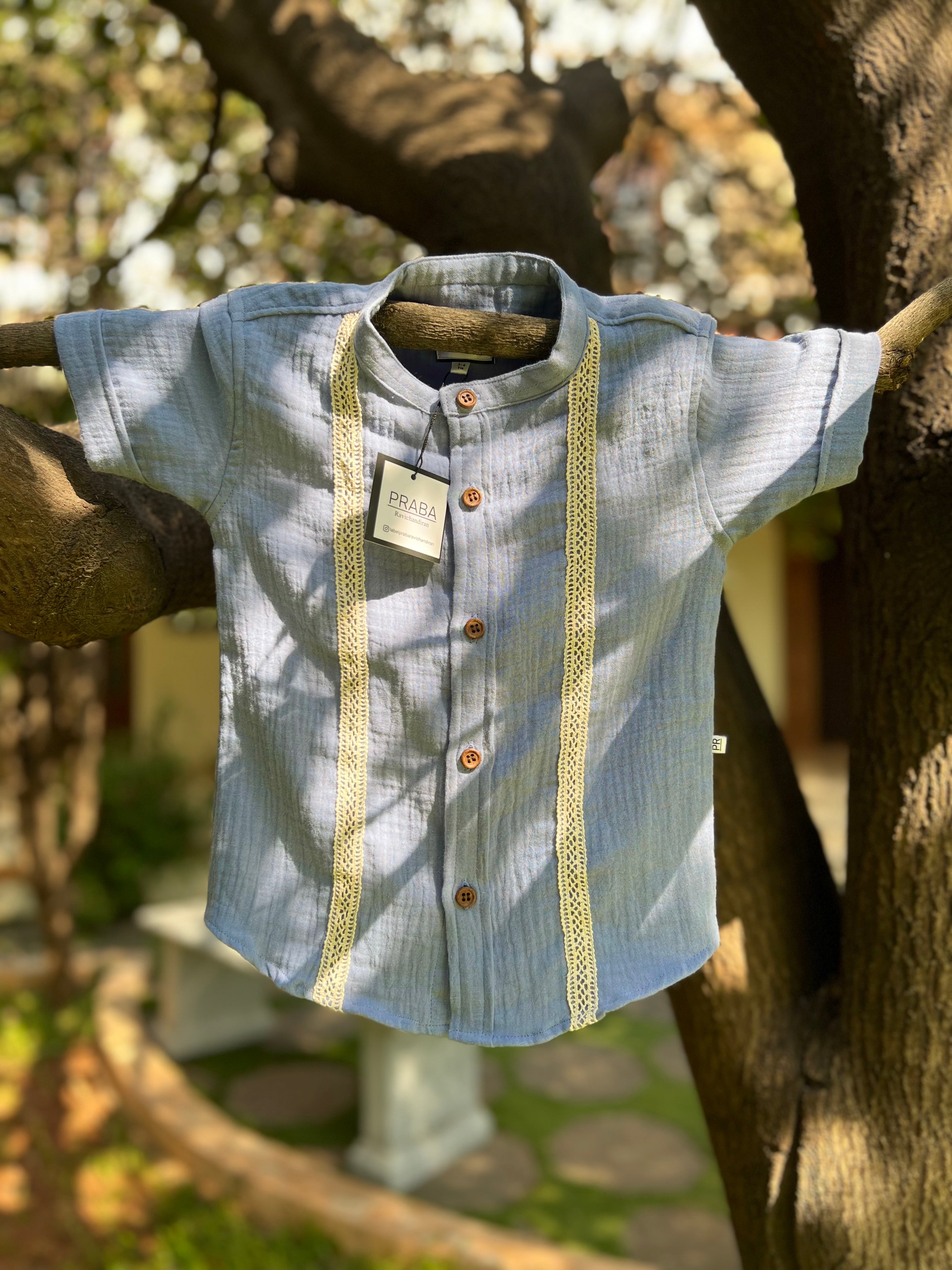 PR’s Signature Style, Light Blue Shirt with Lace