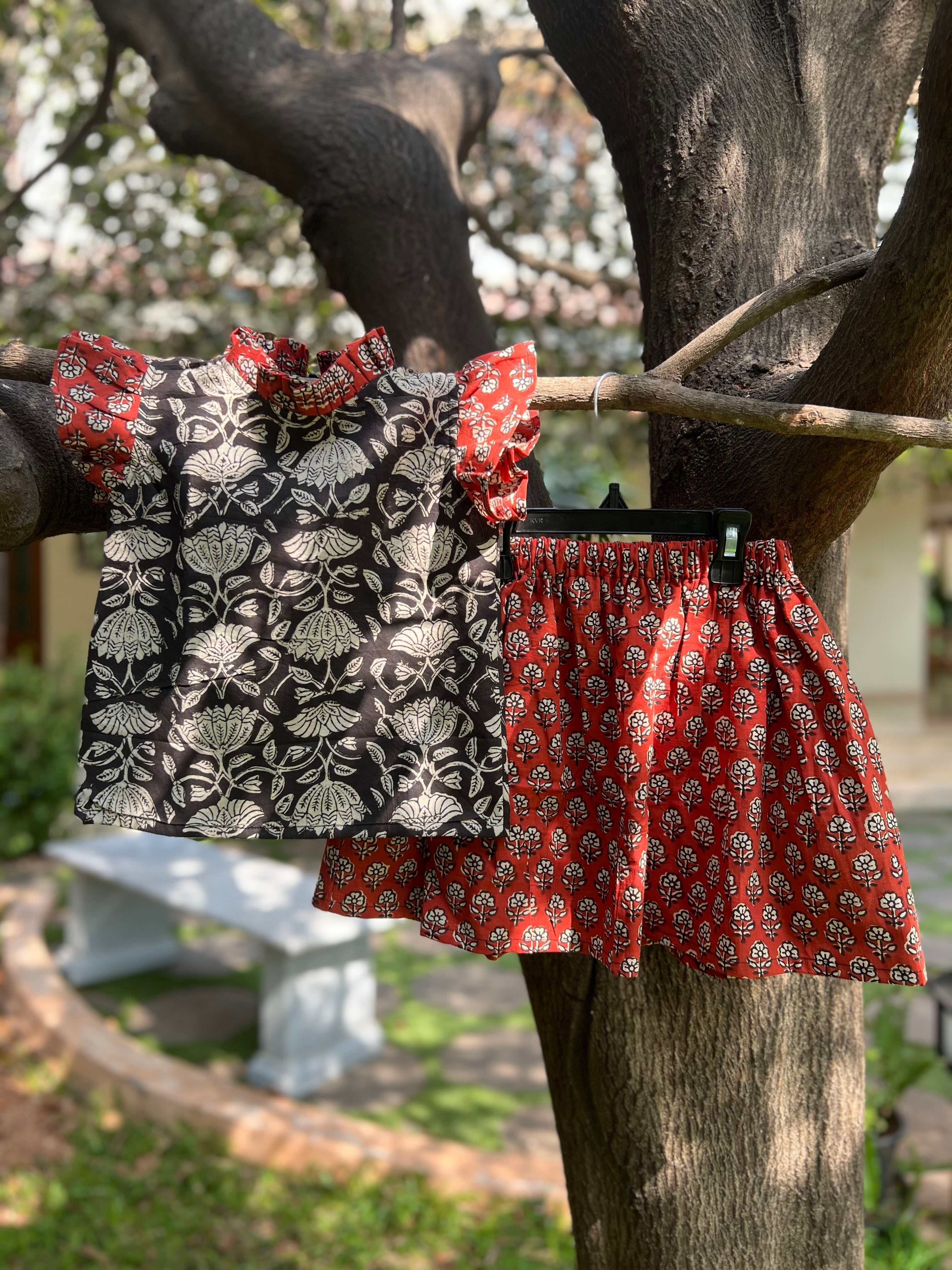 Black Floral Top & Red Skirt