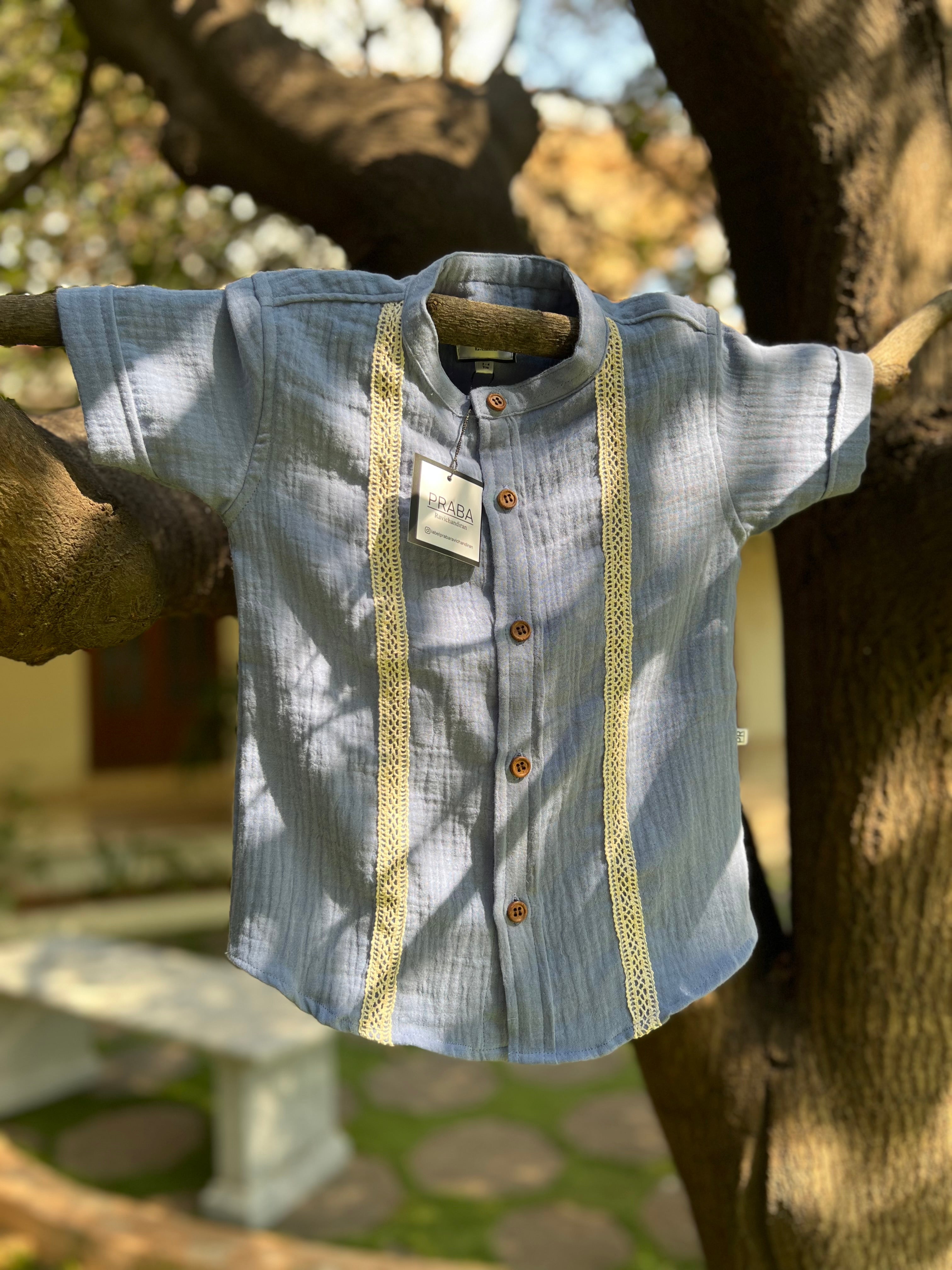 PR’s Signature Style, Light Blue Shirt with Lace