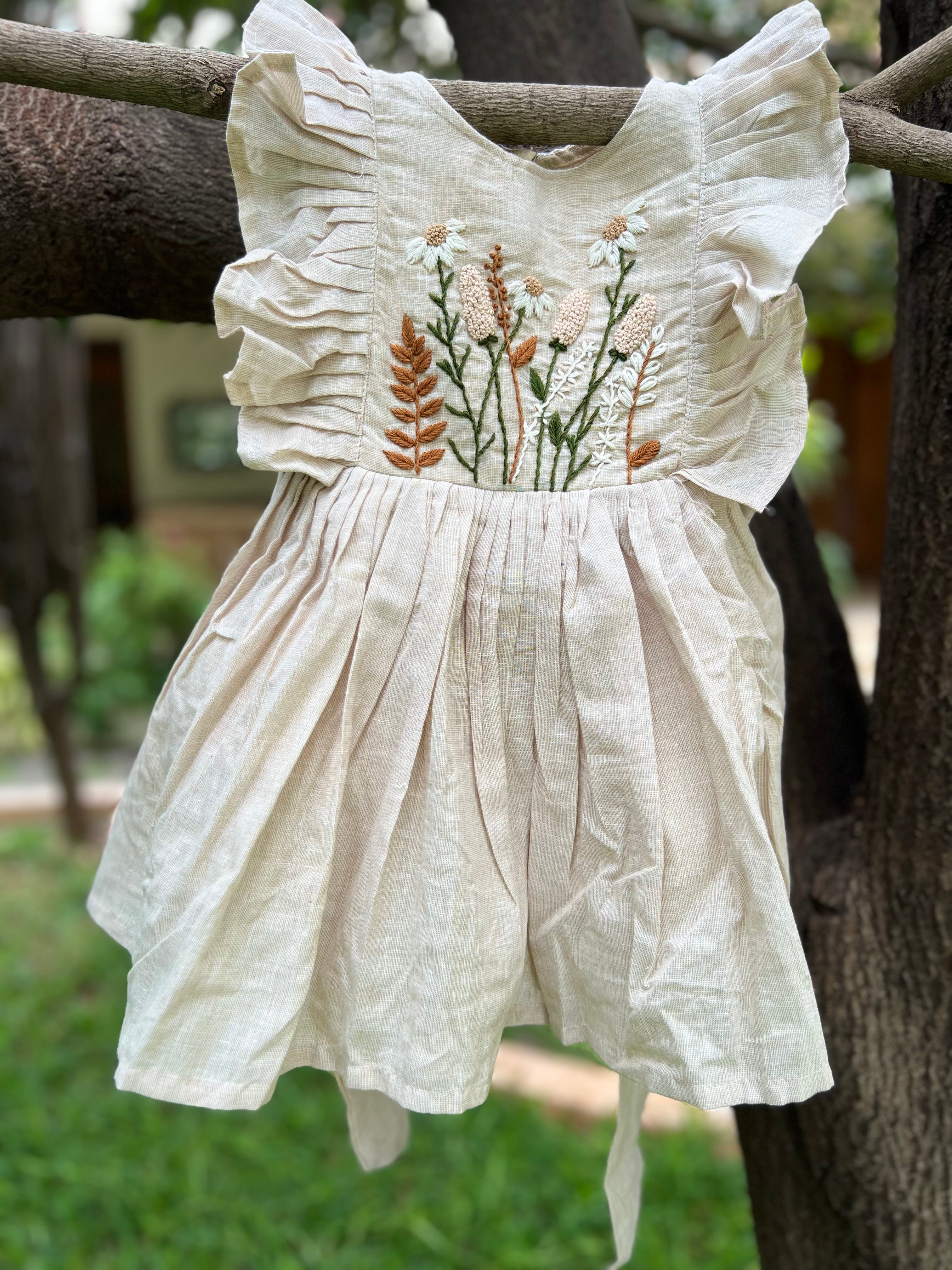 Beige dress with hand embroidered flowers