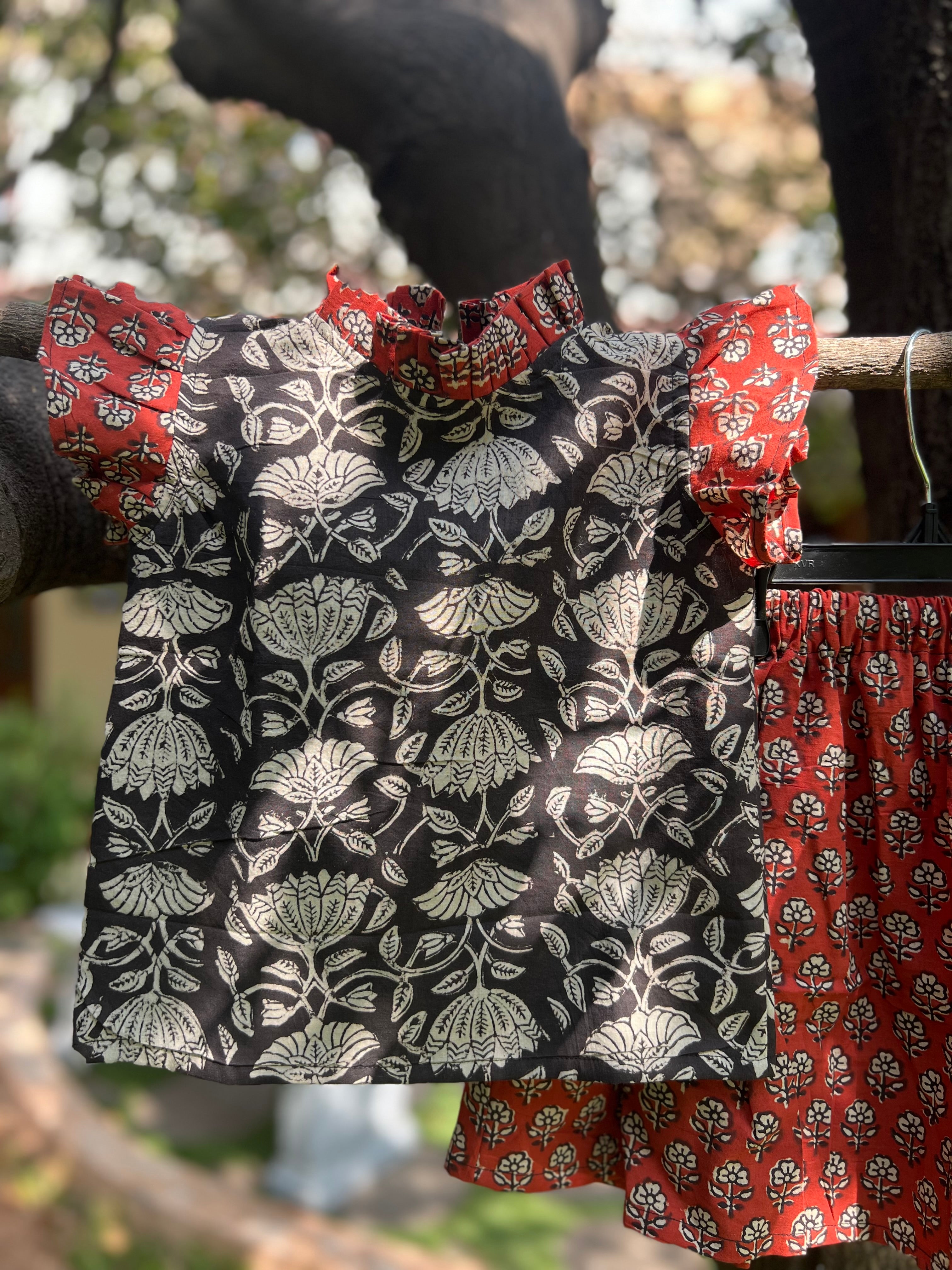 Black Floral Top & Red Skirt
