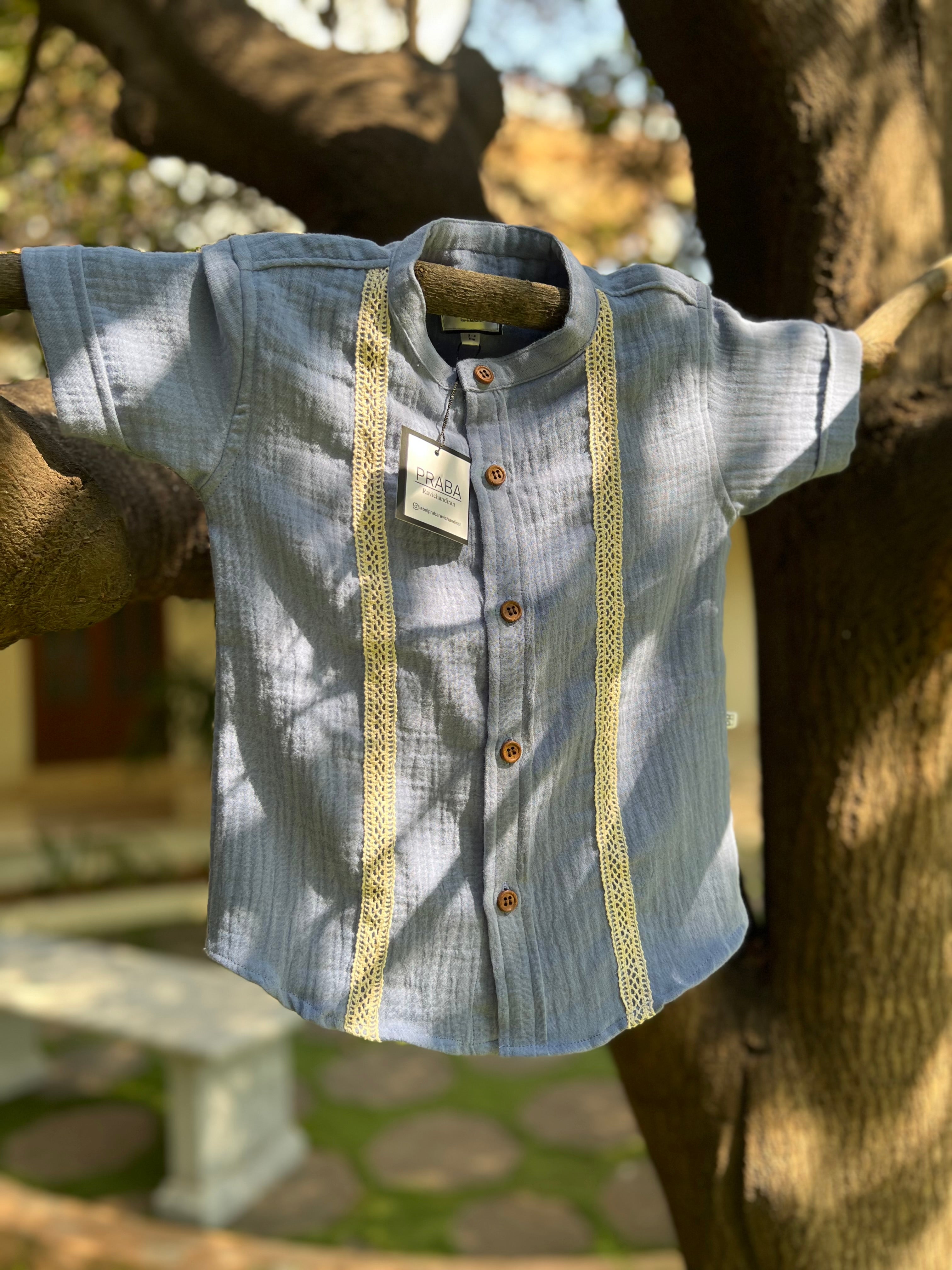 PR’s Signature Style, Light Blue Shirt with Lace