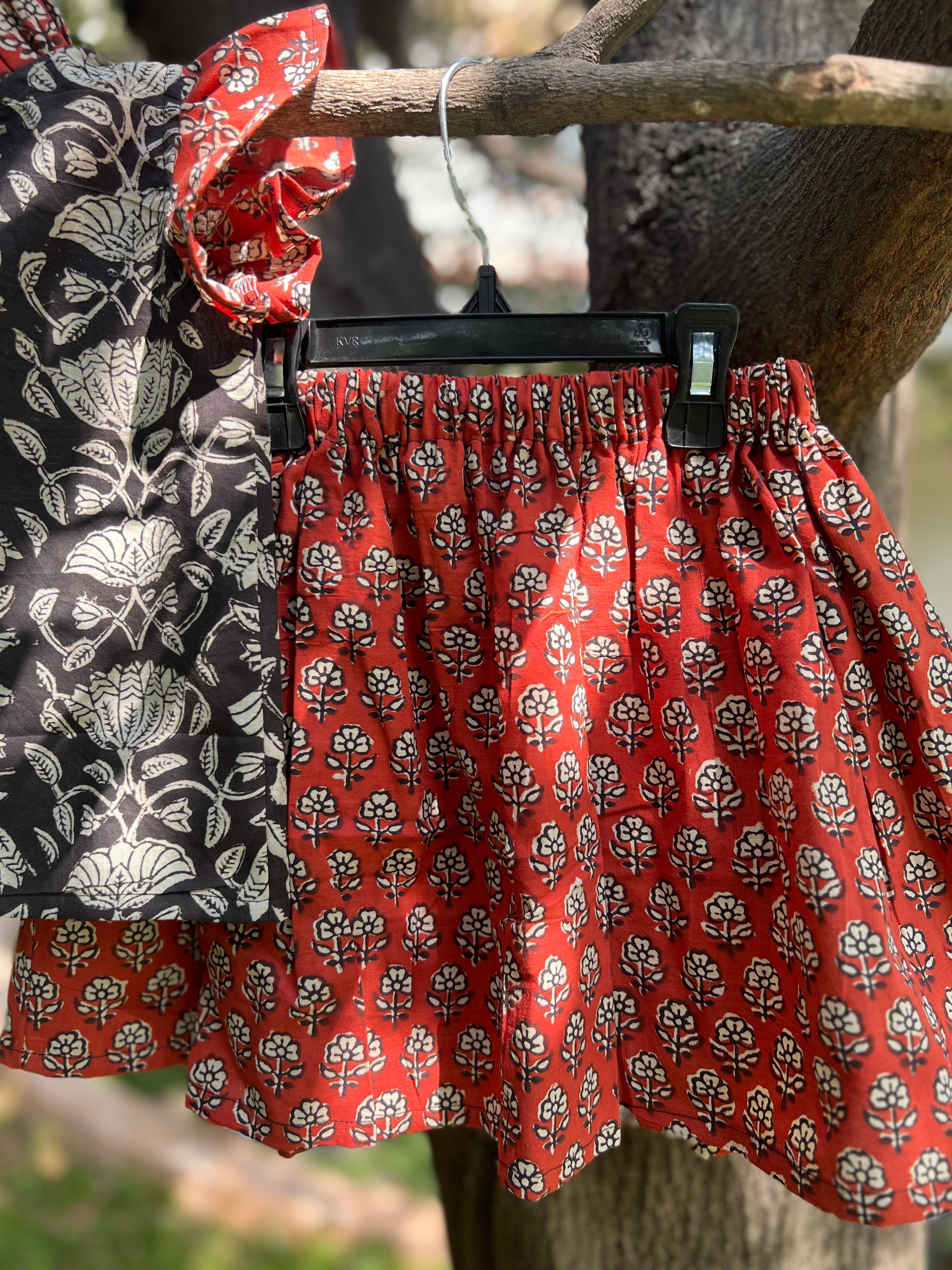 Black Floral Top & Red Skirt