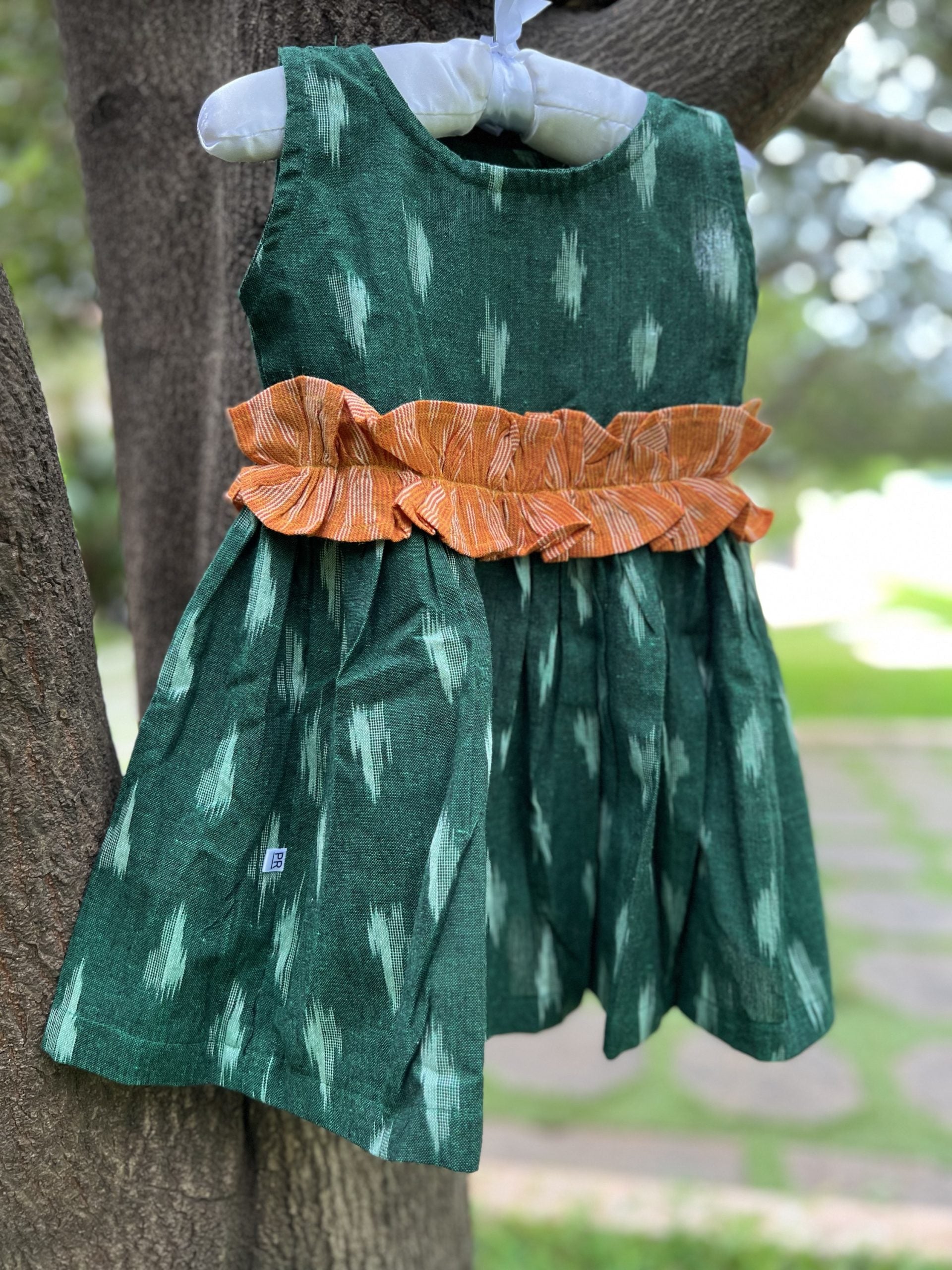 Green Ikkat Dress with Orange Ruffles