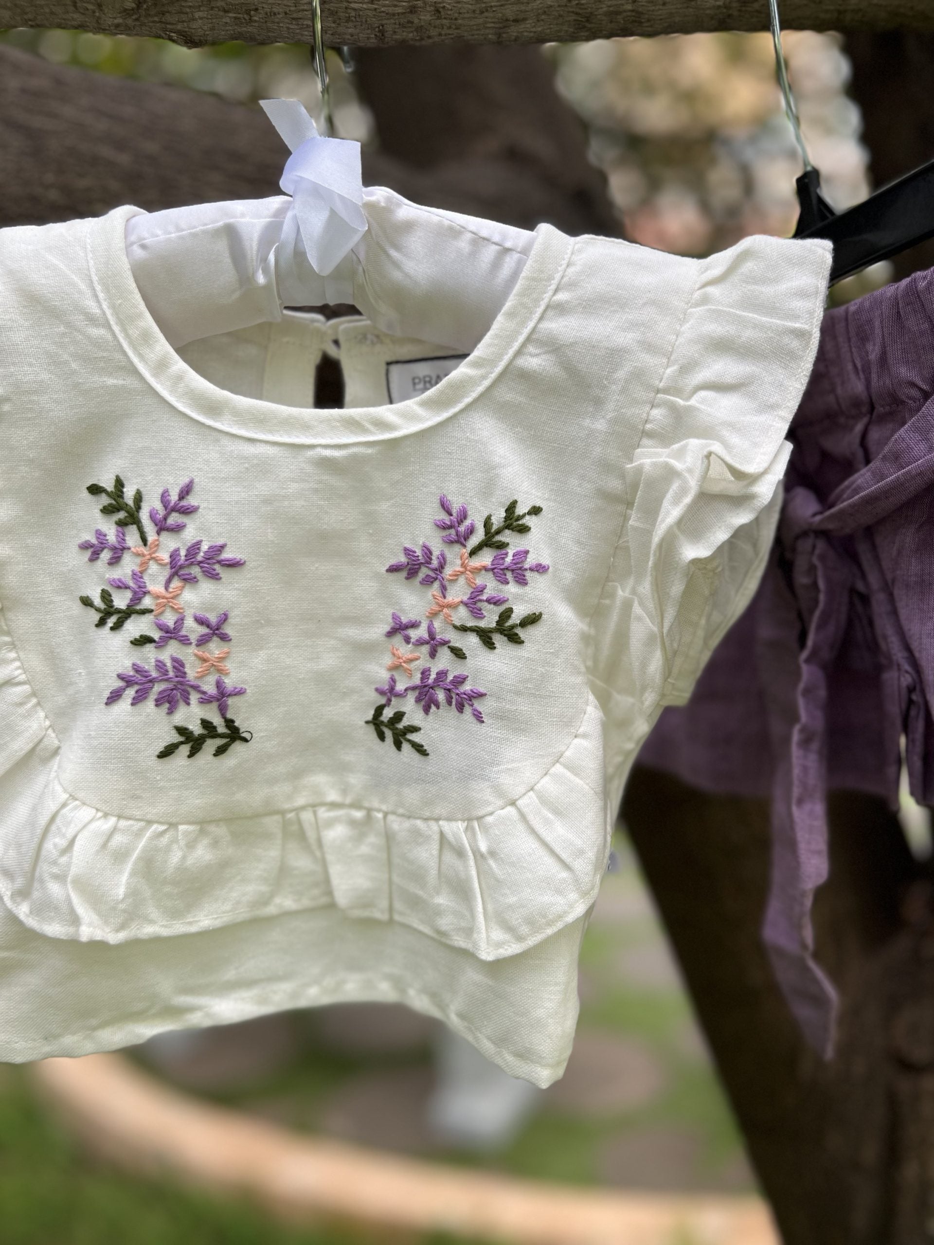 White floral top and bow shorts