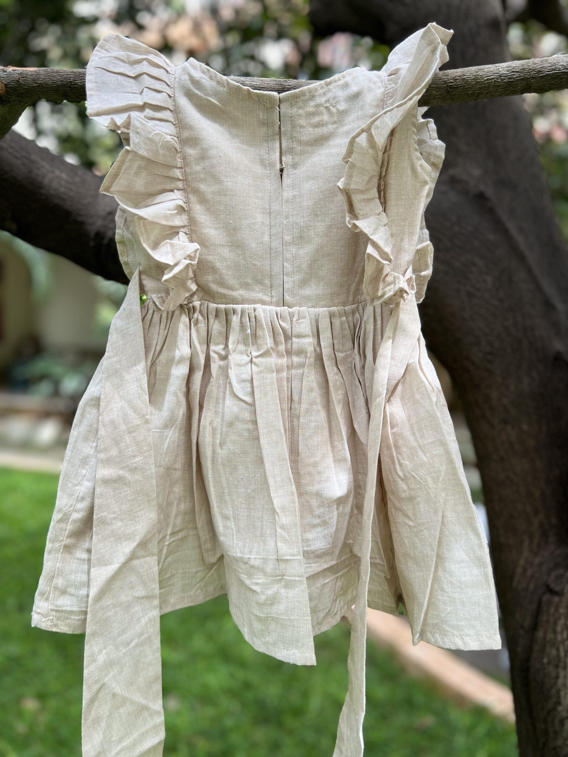 Beige dress with hand embroidered flowers