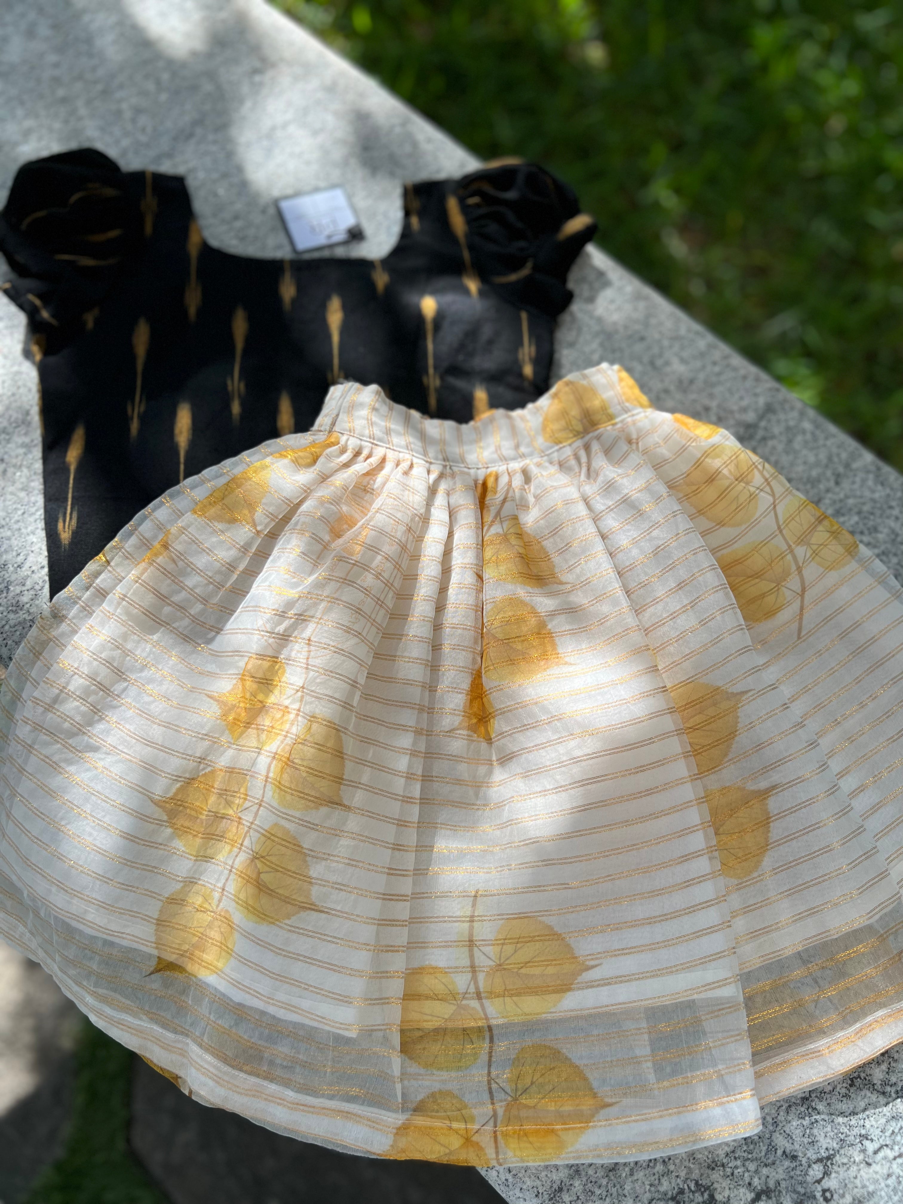 Yellow organza with black