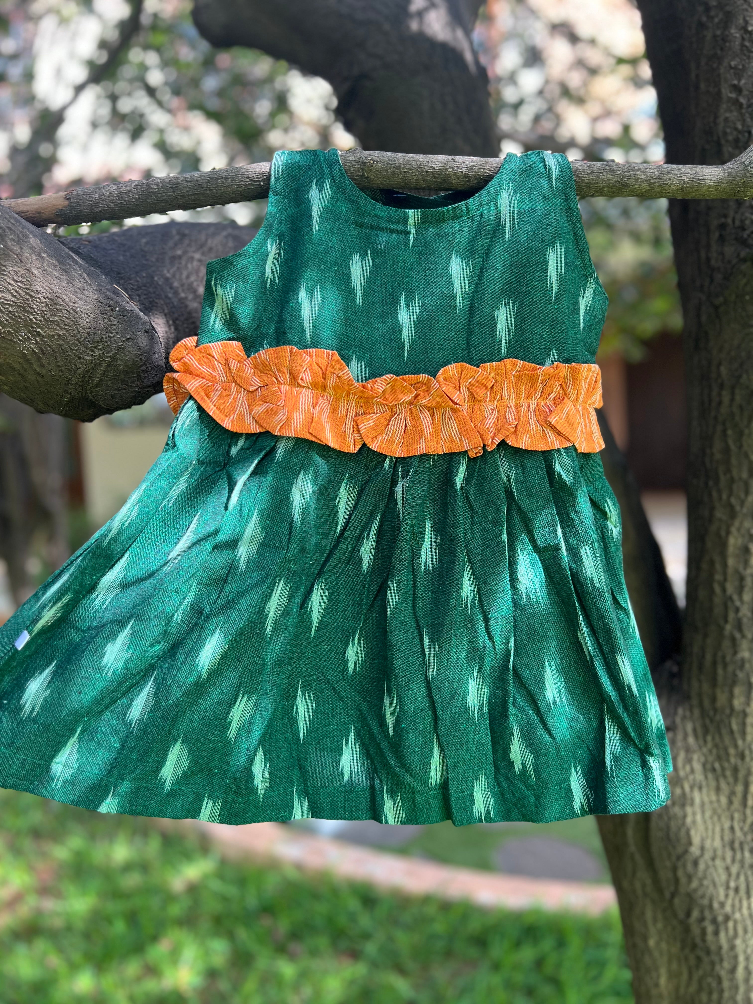 Whimsical Green Ikkat Dress with Orange Ruffles