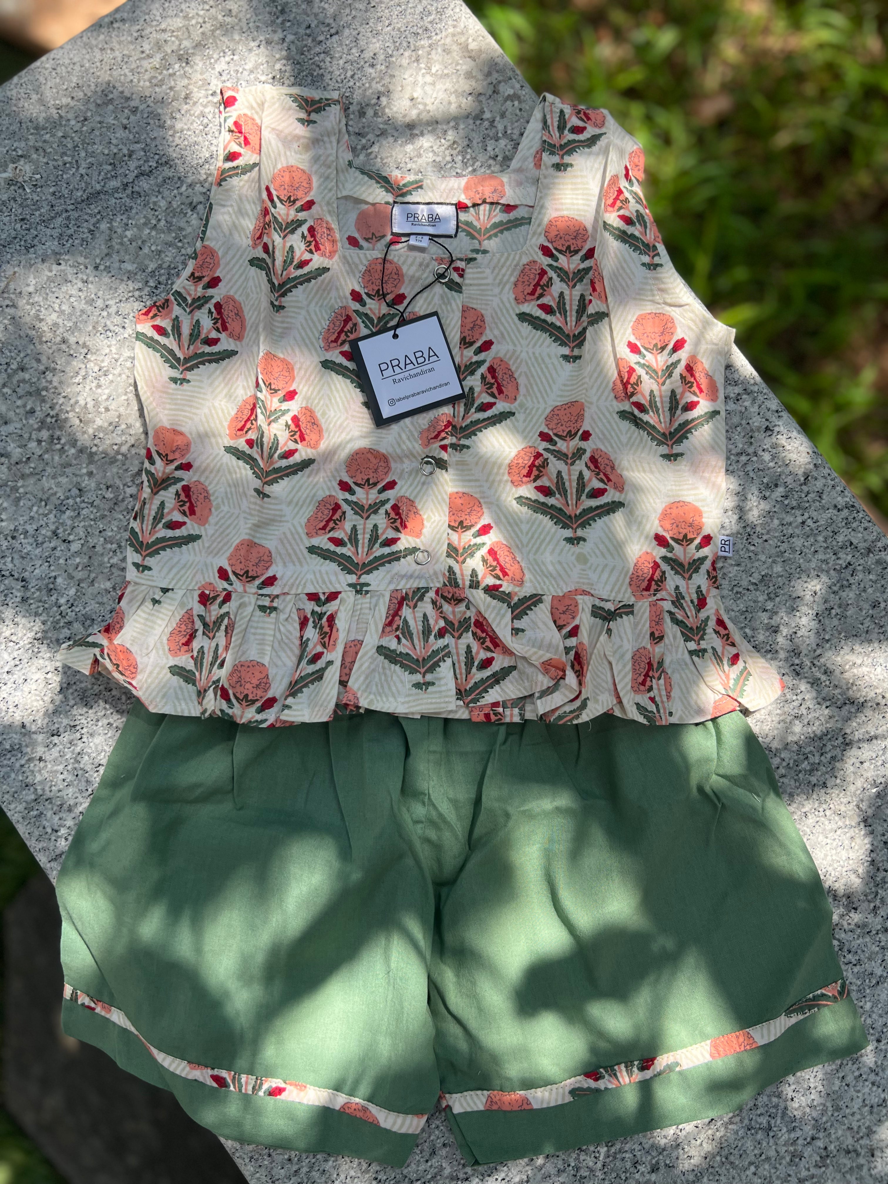 Floral printed tops & green shorts